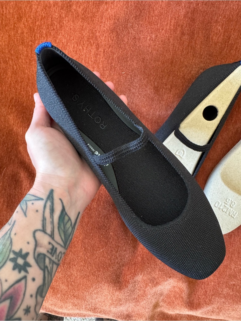 Rothy's Black Knit Ballet Flats with Blue Heel Tab